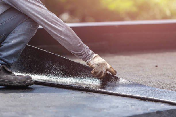 Professional Basement Waterproofing technician working in Sherwood, OH